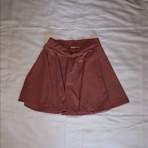 Pink squirt, size medium, and in great condition.